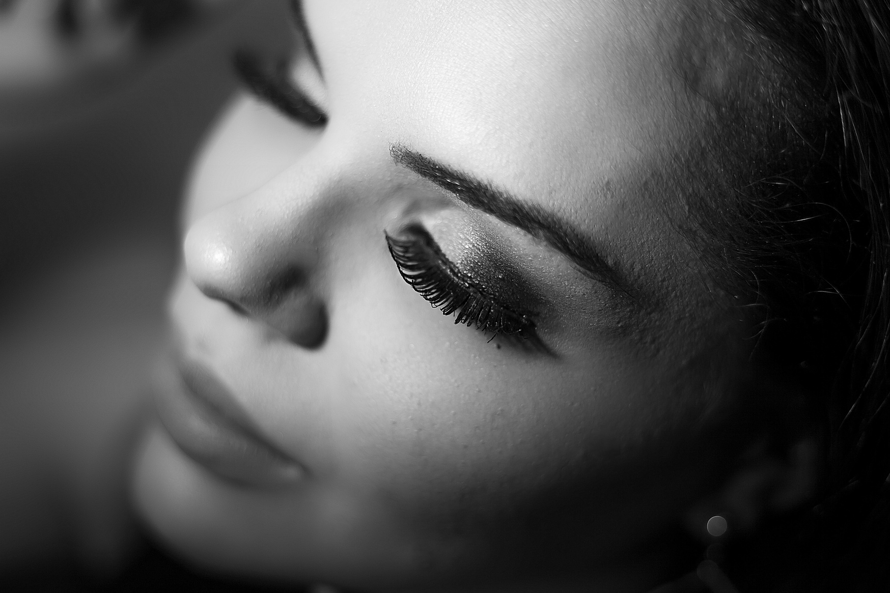 Long lashes on face of young woman